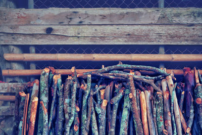 Close-up of wood sticks hanging on wood