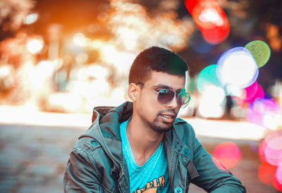 Portrait of young man wearing sunglasses