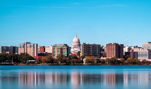 City buildings against blue sky
