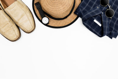 High angle view of shoes over white background