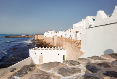 Aerial view over the old medina of asilah with the coast in morocco