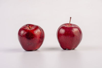 Close-up of apple against white background