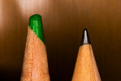 Close-up of colored pencils against white background