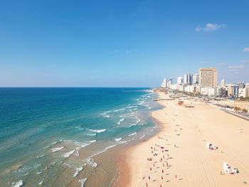 Scenic view of sea against blue sky