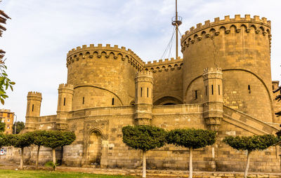 Low angle view of historical building against sky