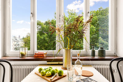 View of fruits on table against the window
