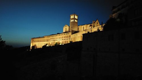 Low angle view of building against sky at night