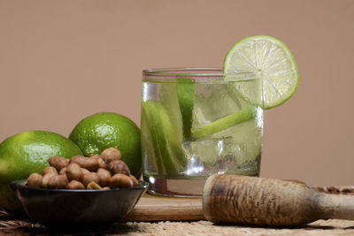 Fruits in container on table