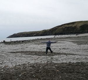 Full length of man on beach against sky