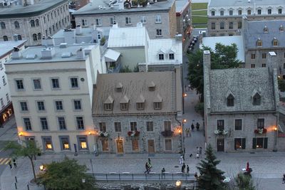 High angle view of street amidst buildings in city