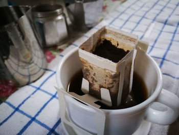 High angle view of coffee cup on table