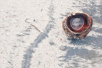 High angle view of rusty metal on road