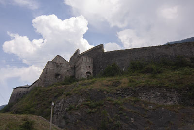 Low angle view of historic building against sky