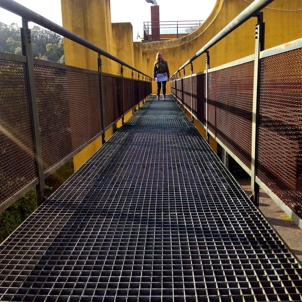 WALKWAY AMIDST CITY