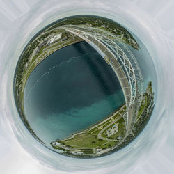 High angle view of glass against sky