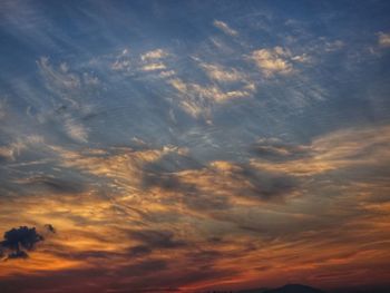 Low angle view of clouds in sky during sunset