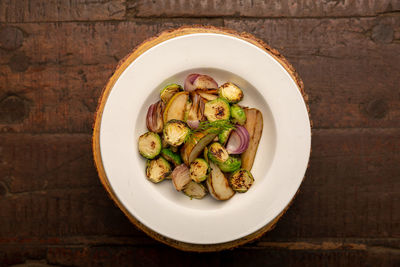 High angle view of mushrooms in bowl on table