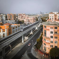 High angle view of street amidst buildings in city