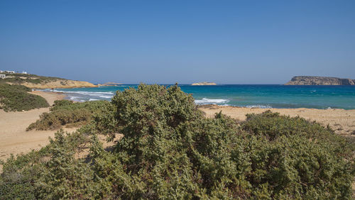 Scenic view of sea against clear blue sky