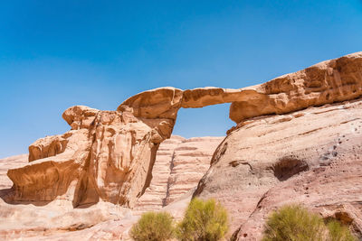 Rock formation against blue sky