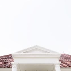 Low angle view of roof against clear sky