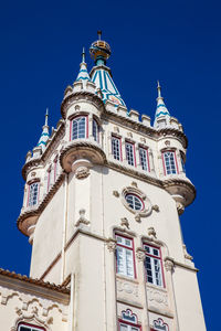 Tower of the sintra town hall building against a beautiful blue sky