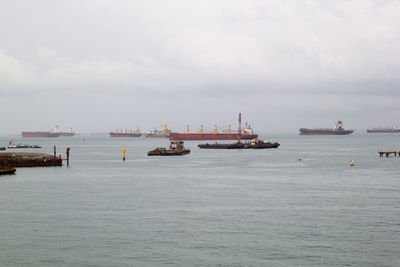 Nautical vessel on sea against sky