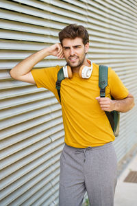 Portrait of young man standing outdoors