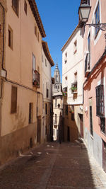 Narrow alley along buildings