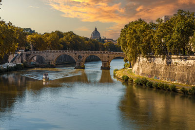 The historic tiber of rome, with its ancient bridges