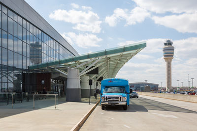 View of bridge and buildings against sky