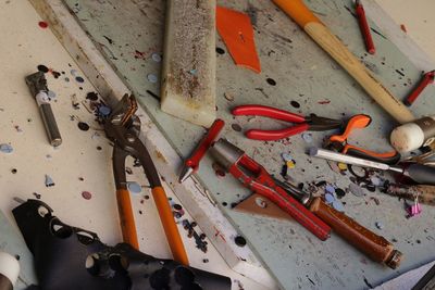 High angle view of hand tools on table