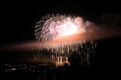 Firework display at night