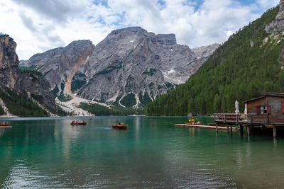 Scenic view of lake and mountains against sky