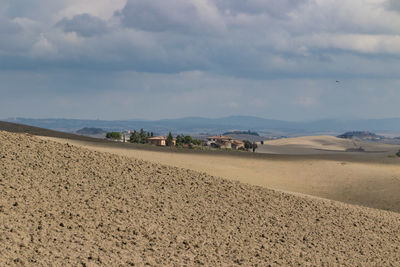 Scenic view of desert against sky