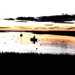 Scenic view of sea at sunset