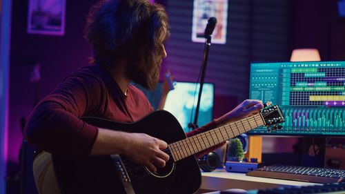 Young man playing guitar