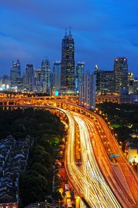 High angle view of light trails on road