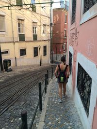 Full length of woman standing in city