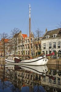 Schiedam sailboat in historic canal