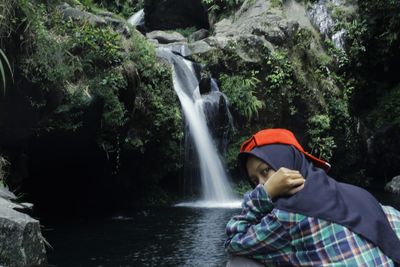 Scenic view of waterfall in forest