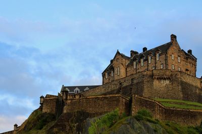 Low angle view of old building against sky