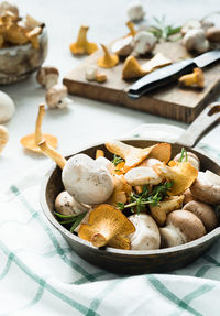 Mushrooms in bowl on table