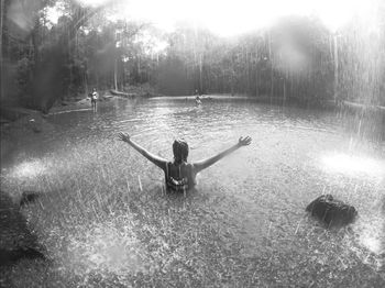 Woman standing in water