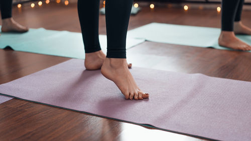 Low section of woman standing on floor