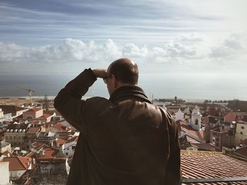 Woman looking at cityscape