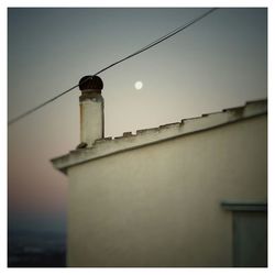 Low angle view of street light against sky