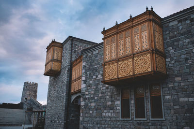 Low angle view of historic building against sky