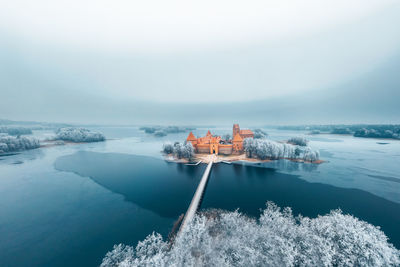 Scenic view of sea against sky during winter