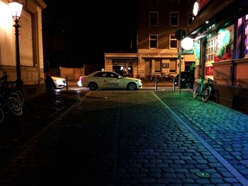 Cars on road at night